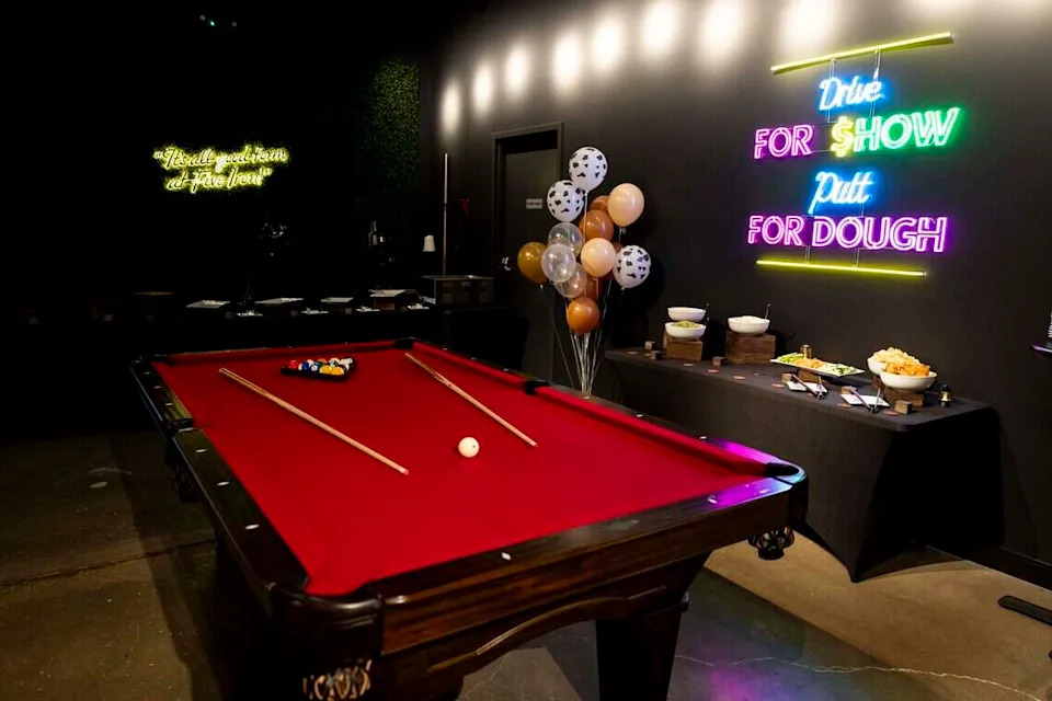 Five Iron Golf has a pool table and darts, along with its golf simulator.