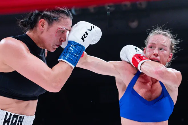 Albuquerque boxer Holly Holm throws a punch at El Paso boxer Stephanie Han during their WBA lightweight world championship bout Saturday, May 30, 2026, at the El Paso County Coliseum in El Paso, Texas.