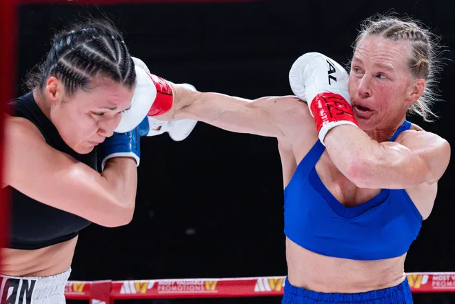 Albuquerque boxer Holly Holm throws a punch at El Paso boxer Stephanie Han during their WBA lightweight world championship bout Saturday, May 30, 2026, at the El Paso County Coliseum in El Paso, Texas.