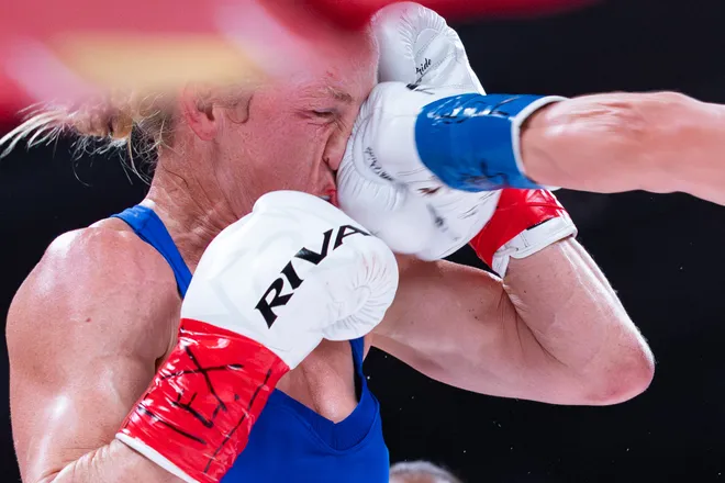 El Paso boxer Stephanie Han throws a punch at Albuquerque boxer Holly Holm during their WBA lightweight world championship bout Saturday, May 30, 2026, at the El Paso County Coliseum in El Paso, Texas.