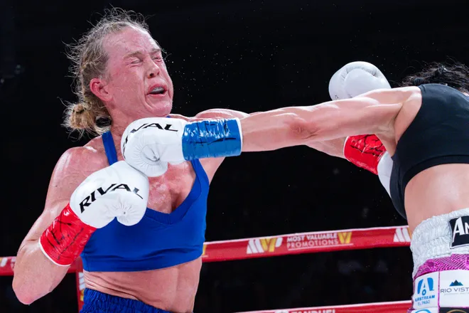 El Paso boxer Stephanie Han throws a punch at Albuquerque boxer Holly Holm during their WBA lightweight world championship bout Saturday, May 30, 2026, at the El Paso County Coliseum in El Paso, Texas.