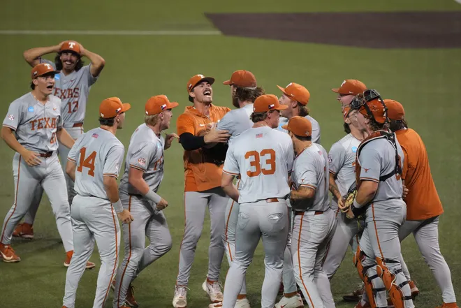 Jun 7, 2026; Austin, TX, USA; Texas Longhorns run on to the field to celebrate after closing out a Super Regional game over the Oregon Ducks and securing a ticket to the College World Series at UFCU Disch-Falk field in Austin, Texas. Mandatory Credit: Scott Wachter-Imagn Images