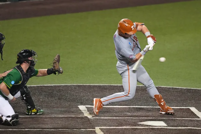 Jun 7, 2026; Austin, TX, USA; Texas Longhorns catcher Carson Tinney (8) hits a single during the fifth inning of a Super Regional game against the Oregon Ducks at UFCU Disch-Falk field in Austin, Texas. Mandatory Credit: Scott Wachter-Imagn Images