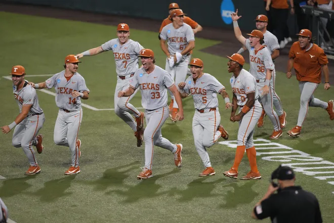 Jun 7, 2026; Austin, TX, USA; Texas Longhorns run on to the field to celebrate after closing out a Super Regional game over the Oregon Ducks and securing a ticket to the College World Series at UFCU Disch-Falk field in Austin, Texas. Mandatory Credit: Scott Wachter-Imagn Images