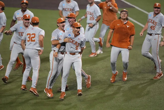Jun 7, 2026; Austin, TX, USA; Texas Longhorns run on to the field to celebrate after closing out a Super Regional game over the Oregon Ducks and securing a ticket to the College World Series at UFCU Disch-Falk field in Austin, Texas. Mandatory Credit: Scott Wachter-Imagn Images