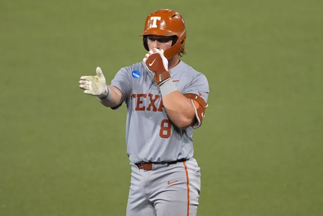 Jun 7, 2026; Austin, TX, USA; Texas Longhorns catcher Carson Tinney (8) reacts after hitting a single during the fifth inning of a Super Regional game against the Oregon Ducks at UFCU Disch-Falk field in Austin, Texas. Mandatory Credit: Scott Wachter-Imagn Images
