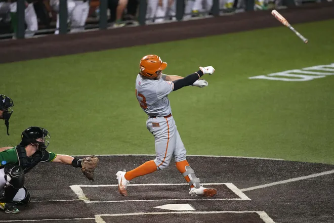 Jun 7, 2026; Austin, TX, USA; Texas Longhorns outfielder Aiden Robbins (43) loses control of the bat during the sixth inning of a Super Regional game against the Oregon Ducks at UFCU Disch-Falk field in Austin, Texas. Mandatory Credit: Scott Wachter-Imagn Images
