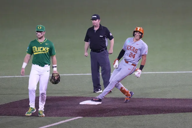 Jun 7, 2026; Austin, TX, USA; Texas Longhorns shortstop Adrian Rodriguez (24) reacts after hitting a go ahead two run double in the eighth inning of a Super Regional game against the Oregon Ducks at UFCU Disch-Falk field in Austin, Texas. Mandatory Credit: Scott Wachter-Imagn Images