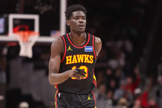 Mar 21, 2026; Atlanta, Georgia, USA; Atlanta Hawks forward Mouhamed Gueye (18) reacts after a basket against the Golden State Warriors in the second quarter at State Farm Arena. Mandatory Credit: Brett Davis-Imagn Images