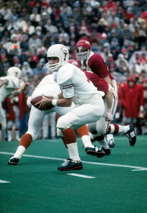 Dec 6, 1969; Fayetteville, AR, USA; FILE PHOTO; Texas Longhorns quarterback James Street (16) in action against the Arkansas Razorbacks at Razorback Stadium. This game was deemed the game of the century at the time. Mandatory Credit: Malcolm Emmons-USA TODAY Sports