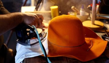 Soccer-Dallas artisan gives cowboy hat a World Cup twist