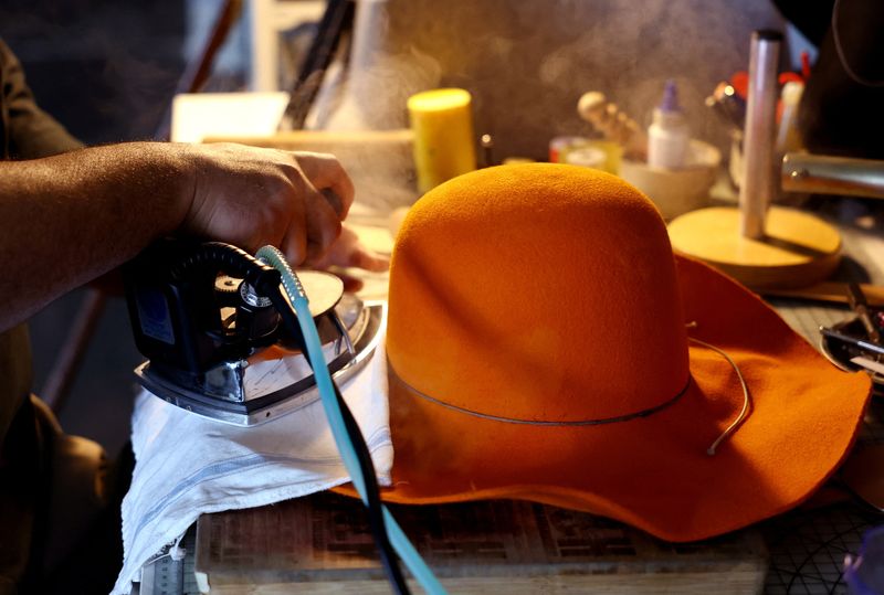 Soccer-Dallas artisan gives cowboy hat a World Cup twist