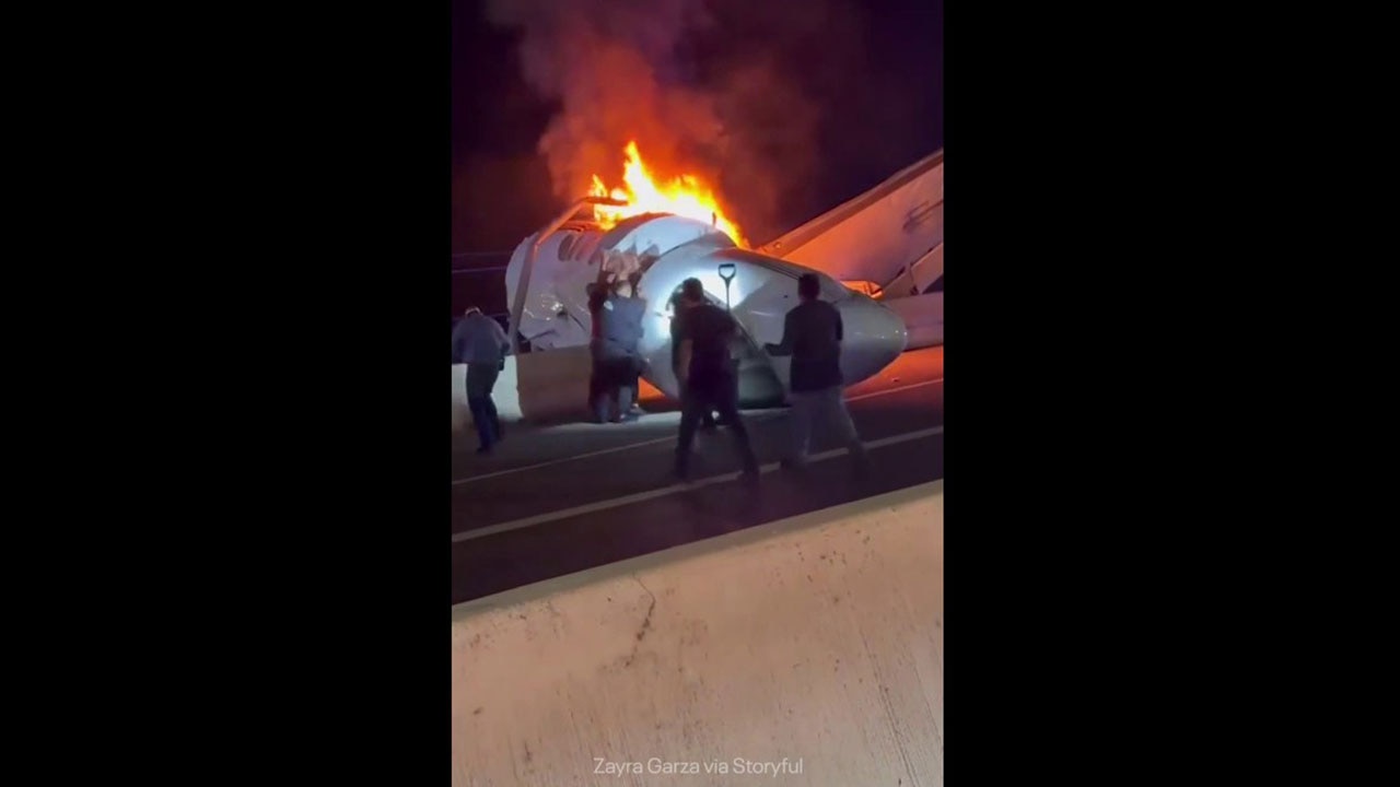 Teams rush to save people trapped in burning plane in Texas