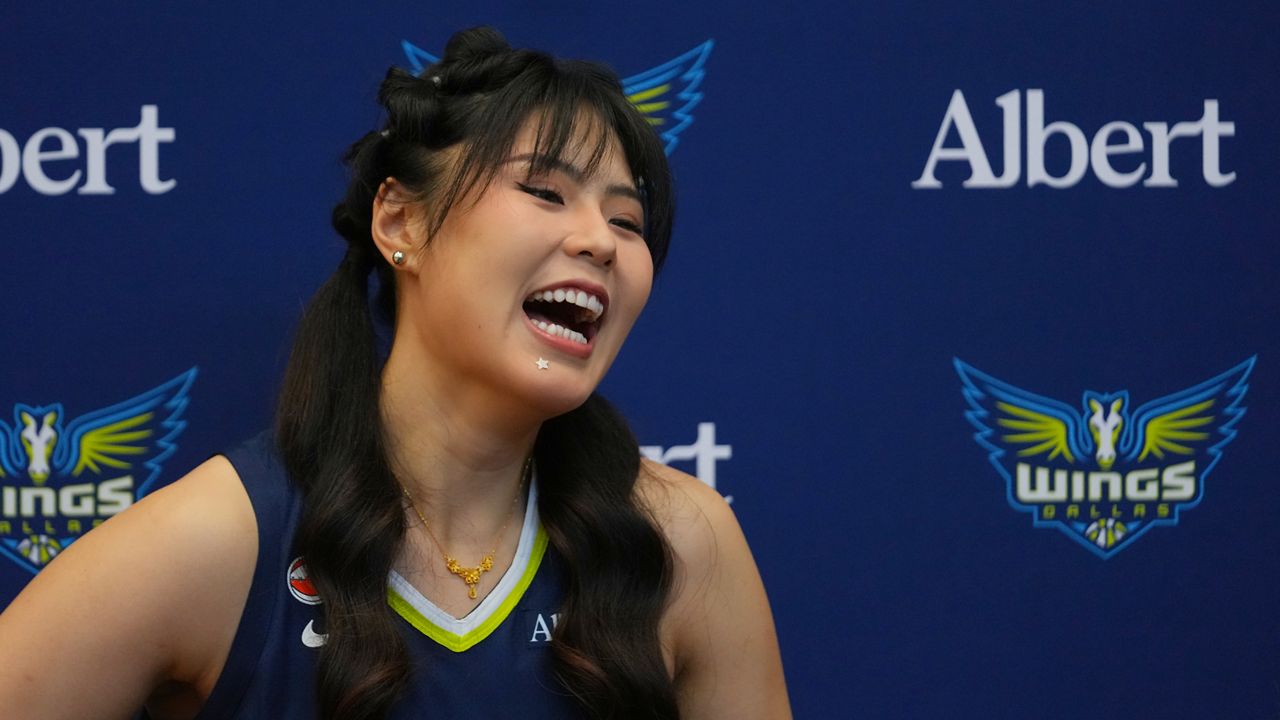 Dallas Wings' center Li Yueru participates in the team's WNBA basketball media day, Monday, April 27, 2026, in Arlington, Texas. (AP Photo/Julio Cortez)