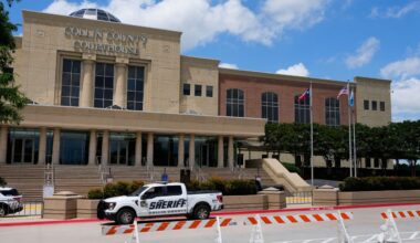 A Collin County seriff drives past the front of the county courthouse Thursday, June 4, 2026, in McKinney, Texas. (AP Photo/Tony Gutierrez)