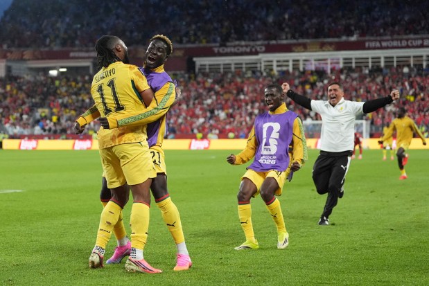 Ghana's Antoine Semenyo, left, celebrates teammate Caleb Yirenkyi's goal during the World Cup Group L soccer match between Ghana and Panama in Toronto, Wednesday, June 17, 2026. (AP Photo/Stephanie Scarbrough)