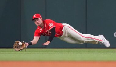 Texas Rangers left fielder Jarred Kelenic dives to catch a fly ball hit by San Diego Padres Jackson Merrill during the sixth inning of a baseball game, Saturday, June 20, 2026, in Arlington, Texas. (AP Photo/LM Otero)