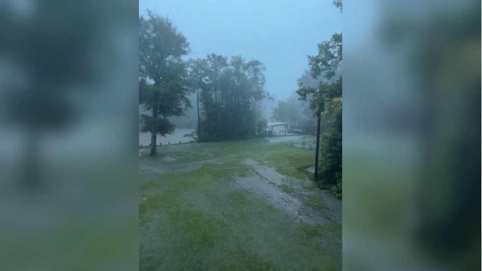 The water crept closer and higher around their Airbnb in Gulfport.