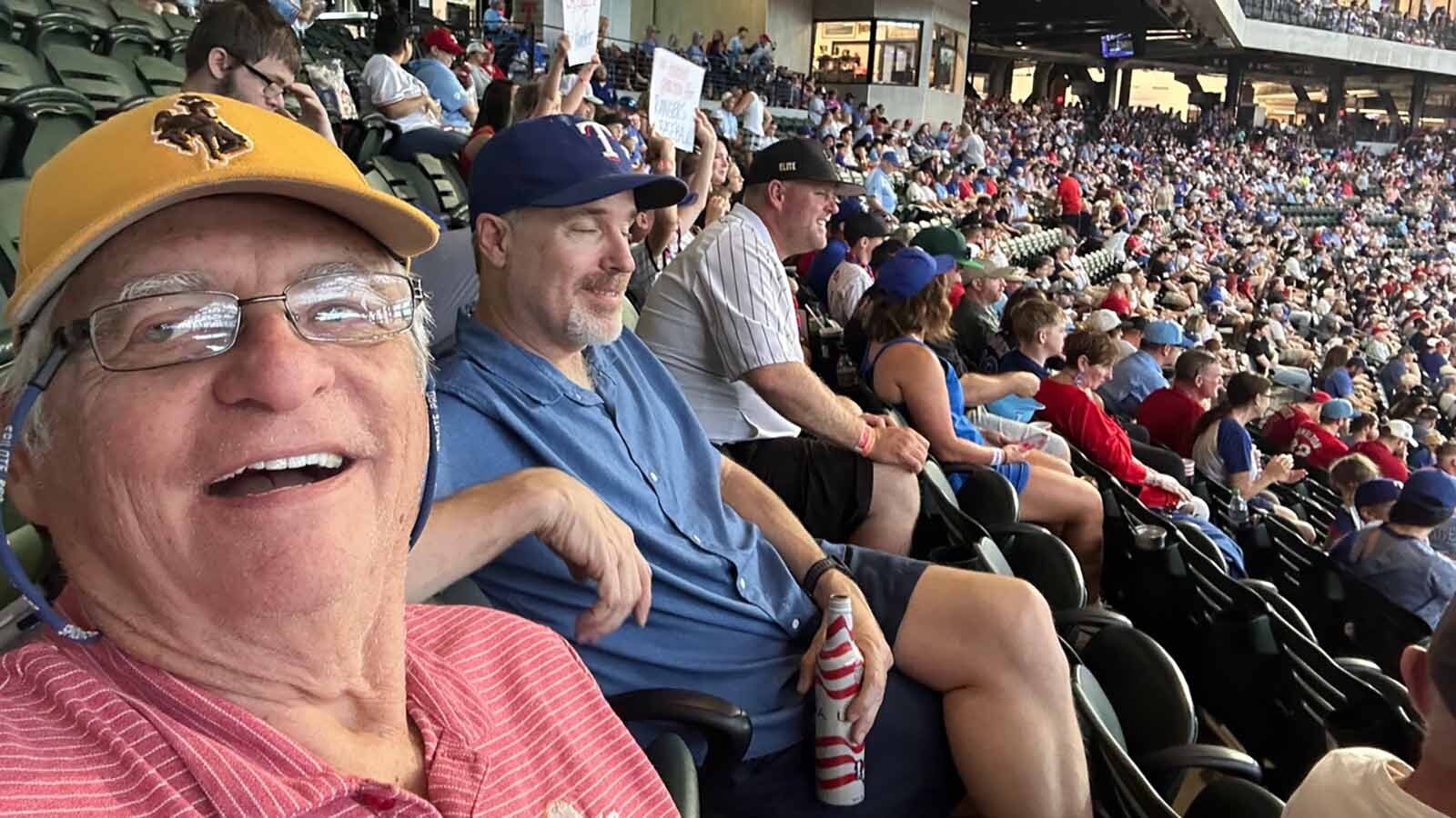 Writer Bill Sniffin enjoying the game with 34,000 other folks on Sunday afternoon, wearing his Wyoming Cowboys baseball hat.