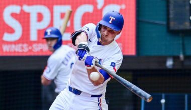 Texas Rangers' Corey Seager swings at a pitch during the fourth inning of a baseball game against the St. Louis Cardinals, Saturday, May 31, 2025, in Arlington, Texas. (AP Photo/Ronaldo Bolaños)