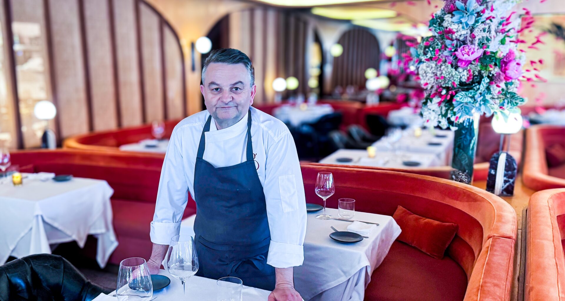 chef bruno davaillon standing in the dining room at Georgie