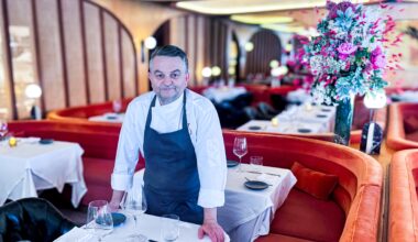 chef bruno davaillon standing in the dining room at Georgie