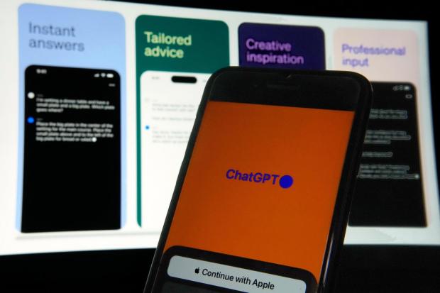 FILE - The ChatGPT app is displayed on an iPhone in New York, May 18, 2023. (AP Photo/Richard Drew, File)