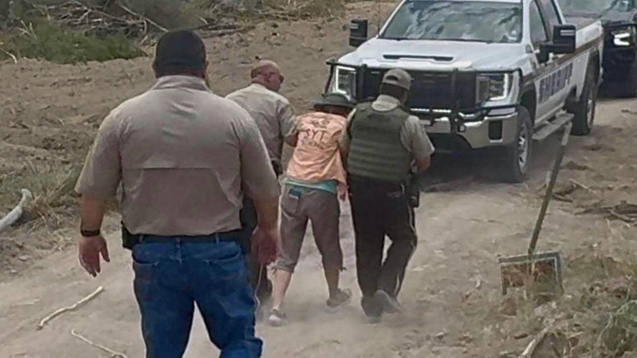 Zapata County deputies arresting San Ygancio resident Elsa Hull. (Courtesy No Border Wall Coalition)