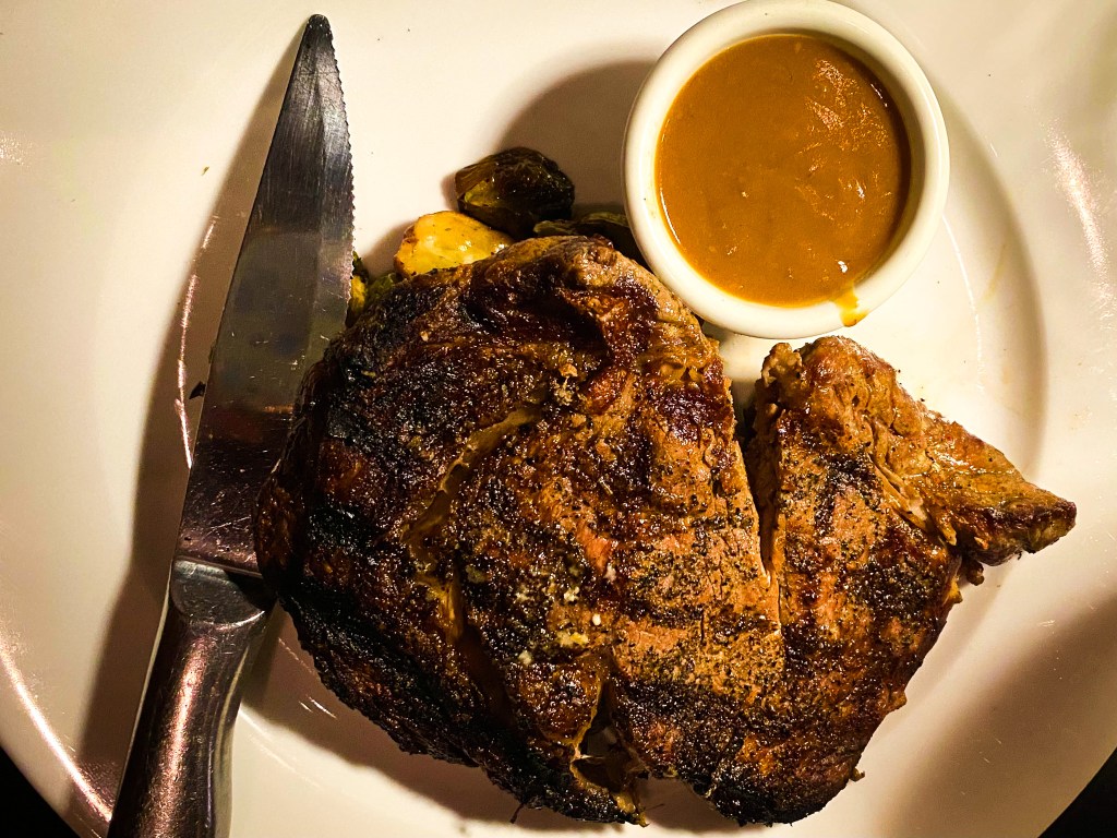 a steak at Crudo Taverno