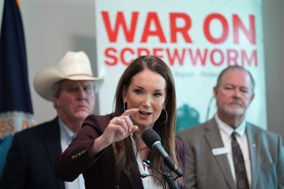 U.S. Agriculture Secretary Brooke Rollins, center, holds a news conference with ranchers,...