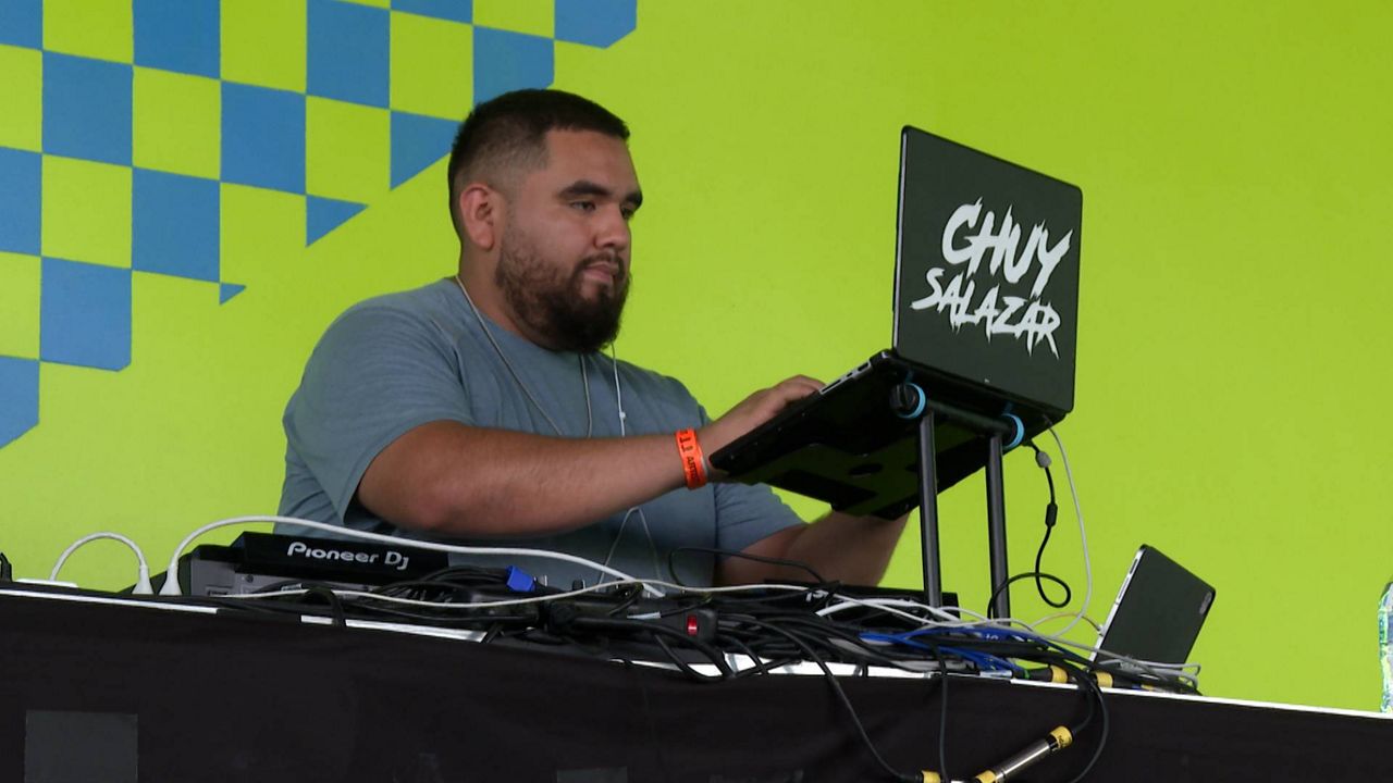 DJ Chuy is the man behind the music at Dallas Stadium