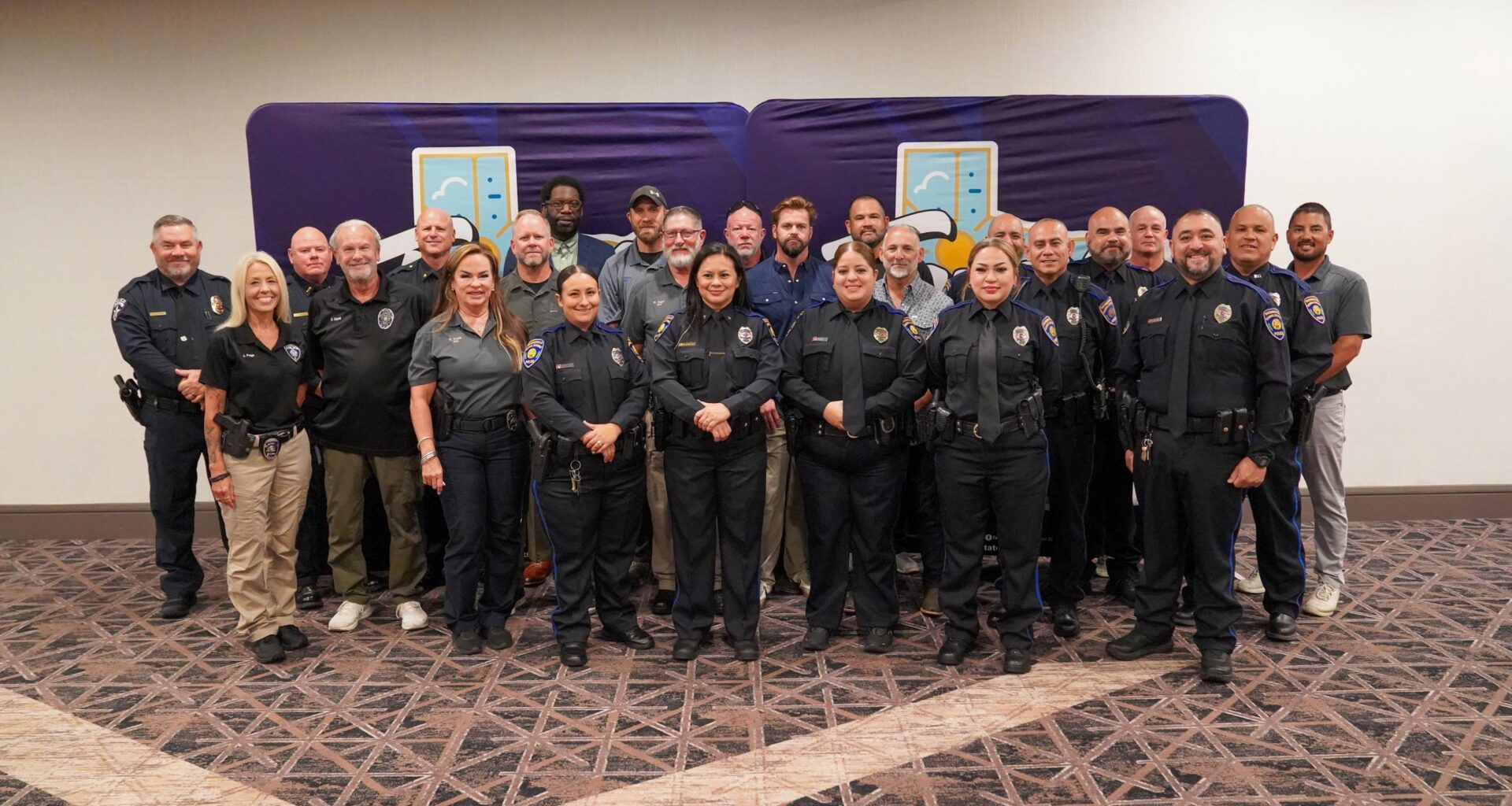 very large group of school safety officials posing for photo