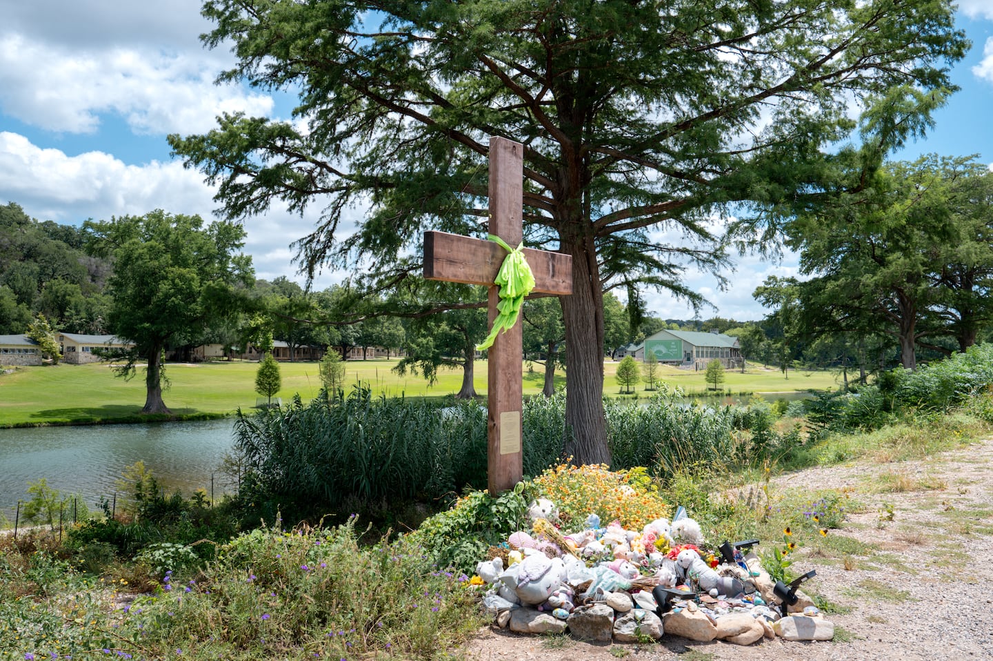 A makeshift memorial dedicated to the lives of the 25 girls and two teenage counselors who were killed during last year's Texas Hill Country flash floods is seen on June 24, 2026 in Hunt, Texas. Camp Mystic has filed for Chapter 11 bankruptcy nearly one year after the devastating July 4th Texas Hill Country floods that claimed the lives of 25 girls and two teenage counselors at the camp’s location along the Guadalupe River.