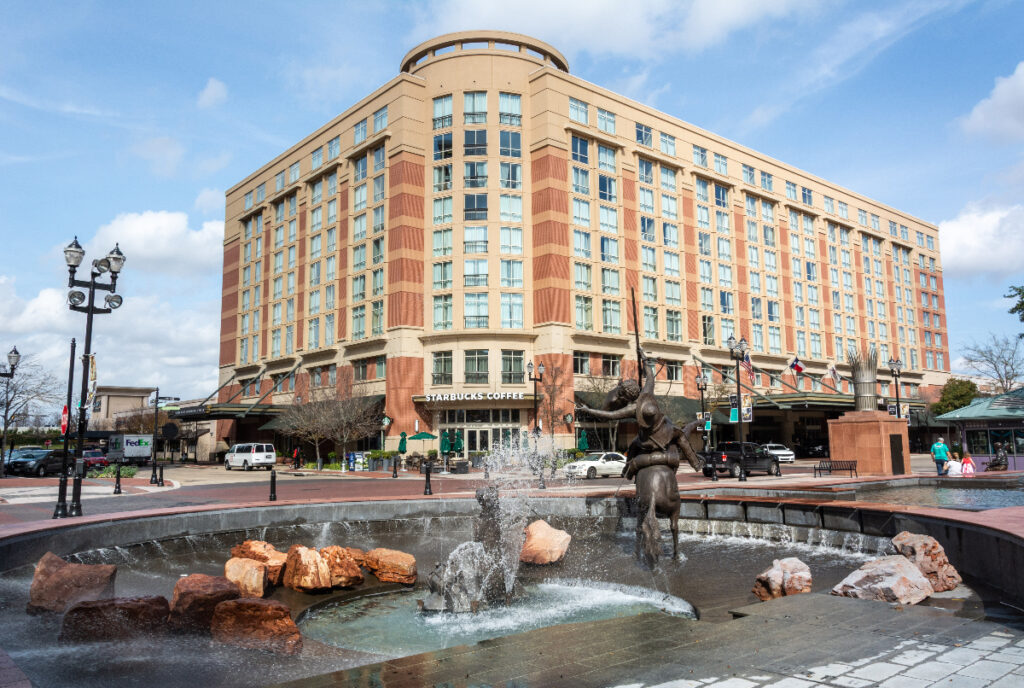 Image shows a building and fountain in Sugar Land, Texas.