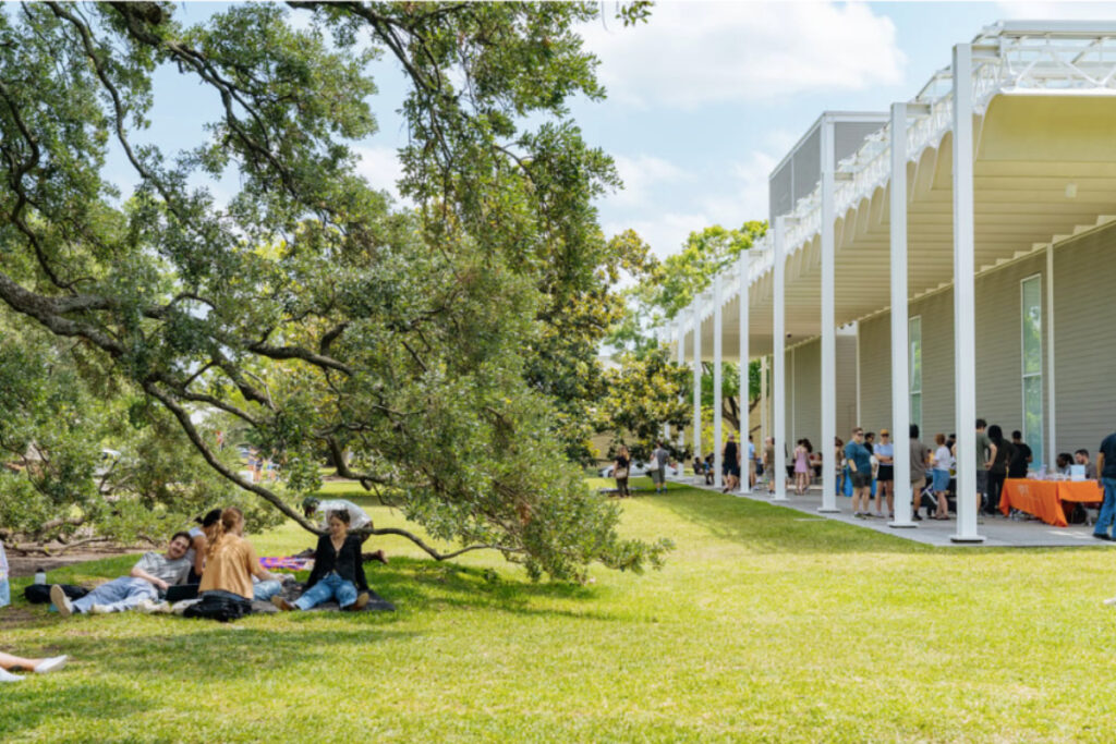 Image shows the Menil Collection lawn and Main Building.