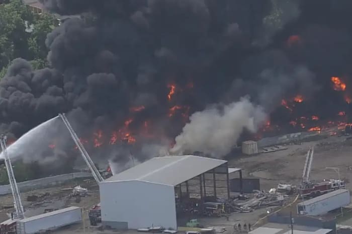 Large trash fire burning in Houston’s East End; firefighters at the scene