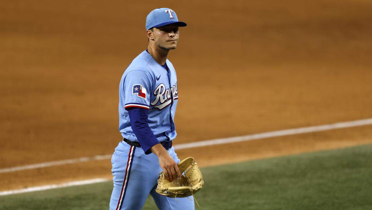 Jack Leiter #22 of the Texas Rangers looks toward the crowd after being relieved during the sixth inning against the Kansas City Royals at Globe Life Field on May 31, 2026 in Arlington, Texas.