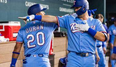 ARLINGTON, TEXAS - JUNE 07: Josh Jung #6 of the Texas Rangers celebrates with Ezequiel Duran #20 after Jung hit a home run during the third inning of a game against the Cleveland Guardians at Globe Life Field on June 07, 2026 in Arlington, Texas. (Photo by John E. Moore III/Getty Images)