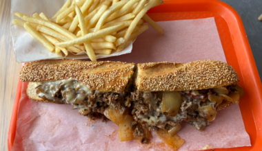 G's cheesesteak served as a lunch special with fries.
