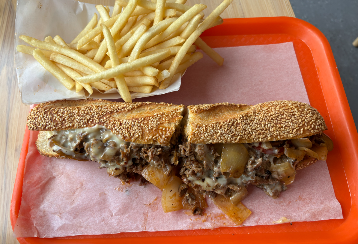 G's cheesesteak served as a lunch special with fries.