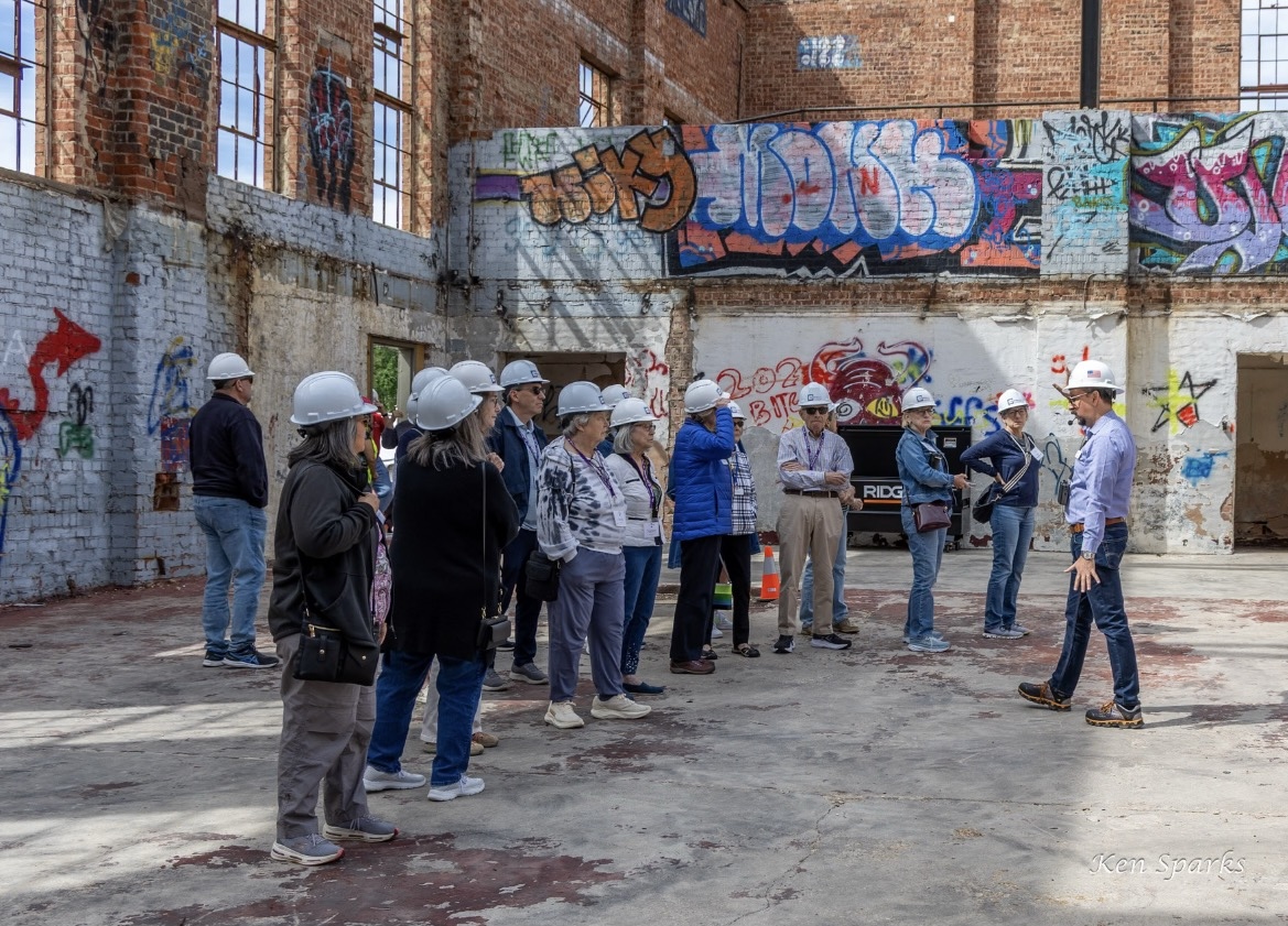 A group of visitors survey the auditorium. These tours provide the nonprofit opportunities to educate the community about the building’s history. Photo courtesy of Ken Sparks/Transform 1012