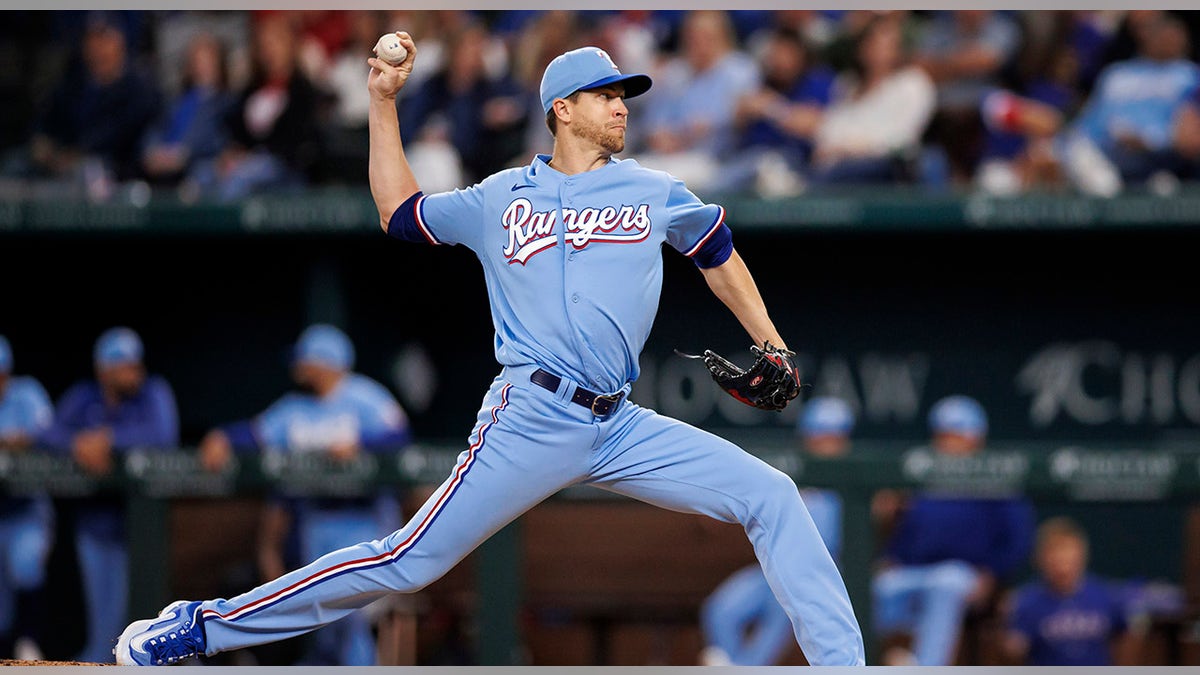Jacob deGrom pitching for the Texas Rangers at Globe Life Field.