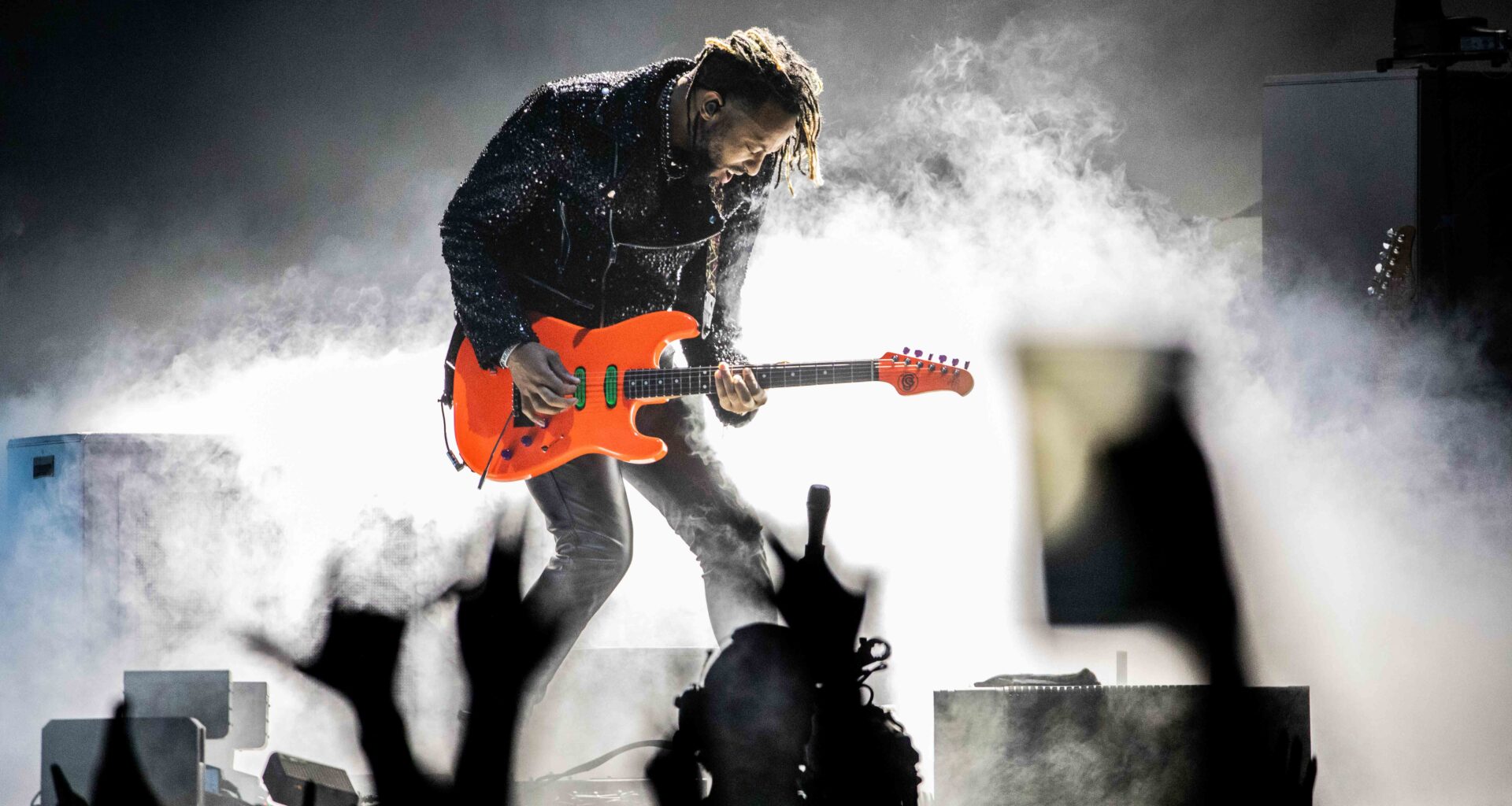 Dallas guitarist on success, touring with Lil' Wayne, MGK & more