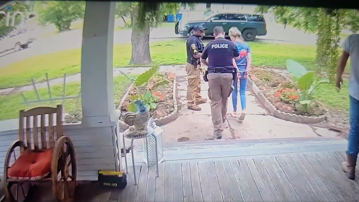 Police arrest Jennifer Combs.