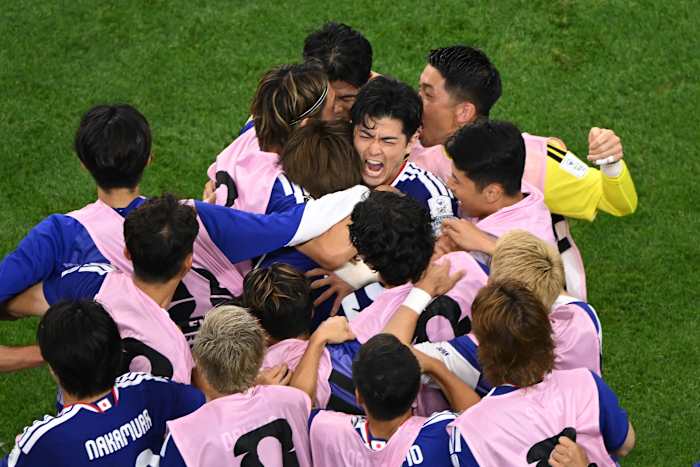 Daichi Kamada's late header gives Japan a 2-2 draw with the Netherlands in World Cup opener for both