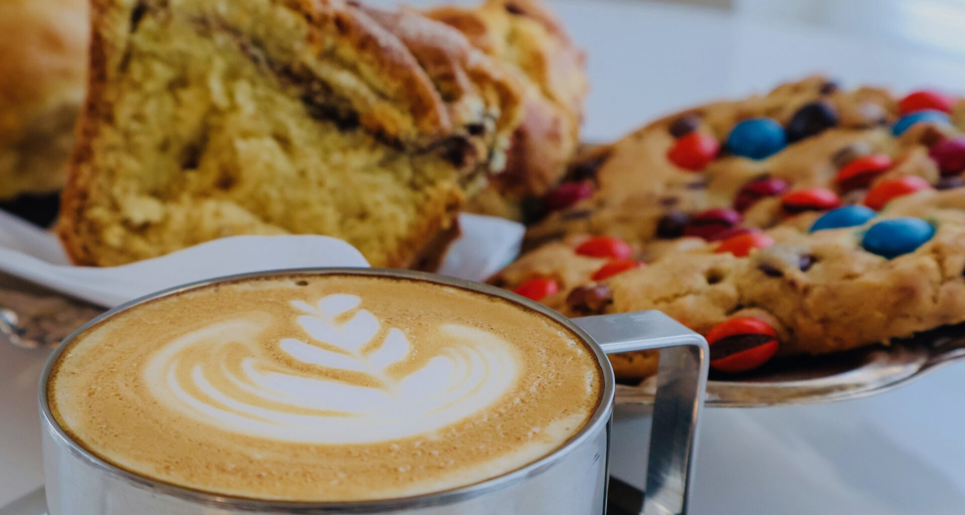 a plate of pastries and a cappuccino at Alma Cafe.