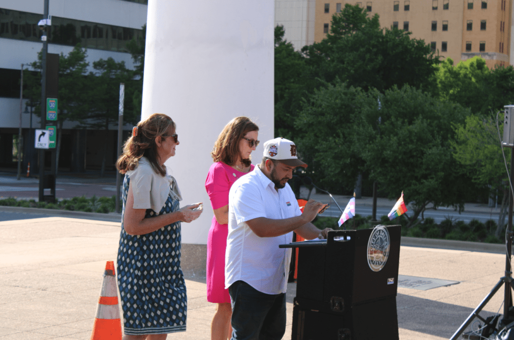Council members Jesse Moreno, Gay Donnell Willis and Paula Blackmon read a proclamation of Pride Month at City Hall.
