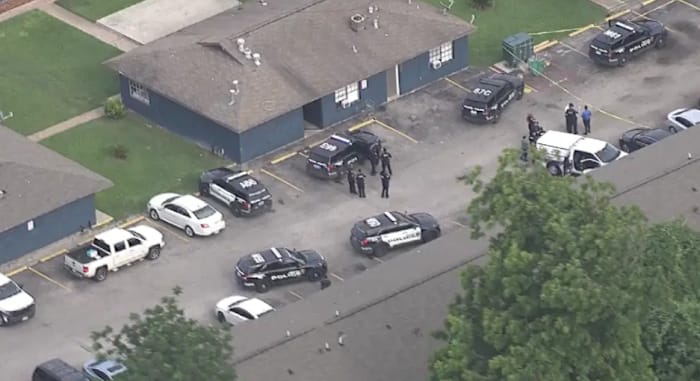 Woman fatally shot at Houston apartment complex after ongoing dispute; neighbor detained by police