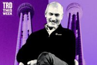 AT&T's John Stankey with a rendering of 5400 Legacy Drive