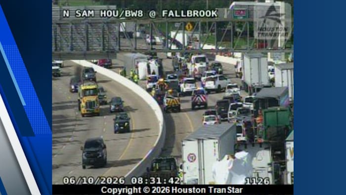 FedEx truck overturns on Sam Houston beltway at Fallbrook